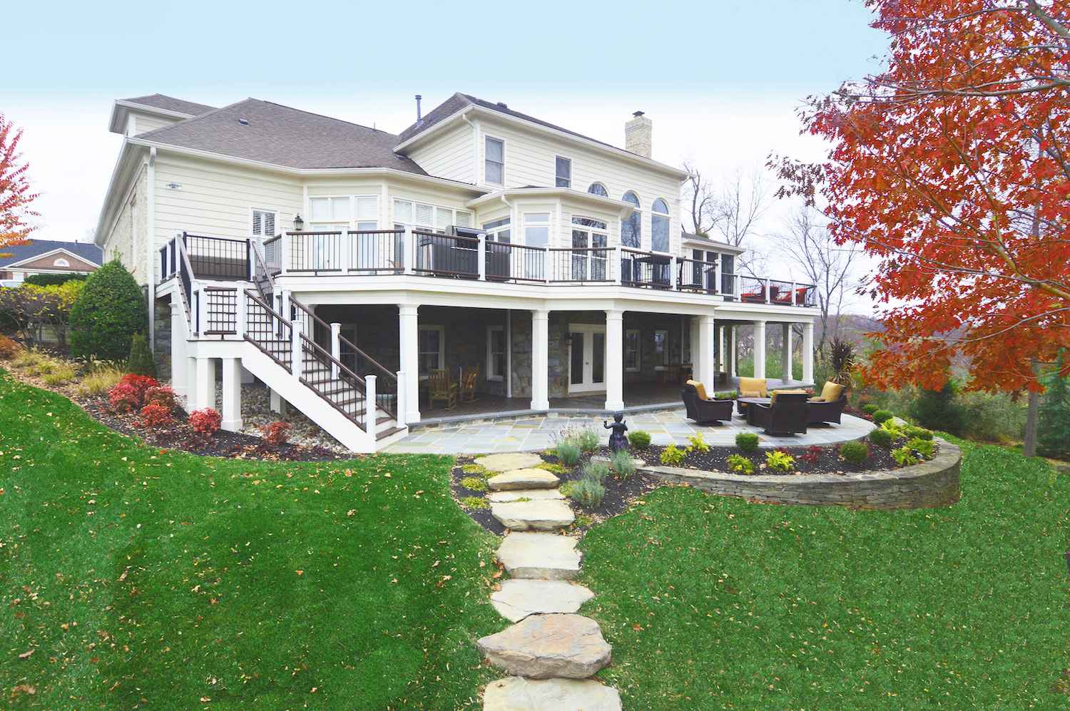 Large Custom Composite Deck With Stairs and Underdeck Living Space