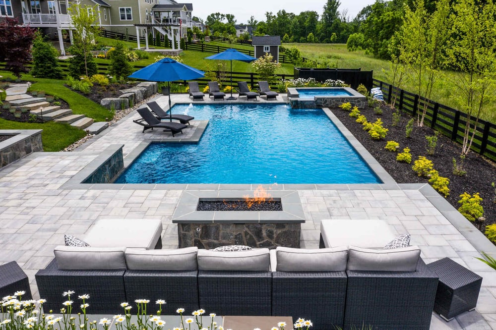 Beautiful stone aerial backyard with pool fire place in northern virginia