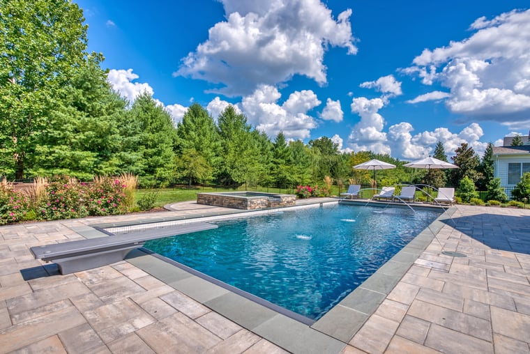 Custom luxury in-ground pool in Northern Virginia by Deckscapes