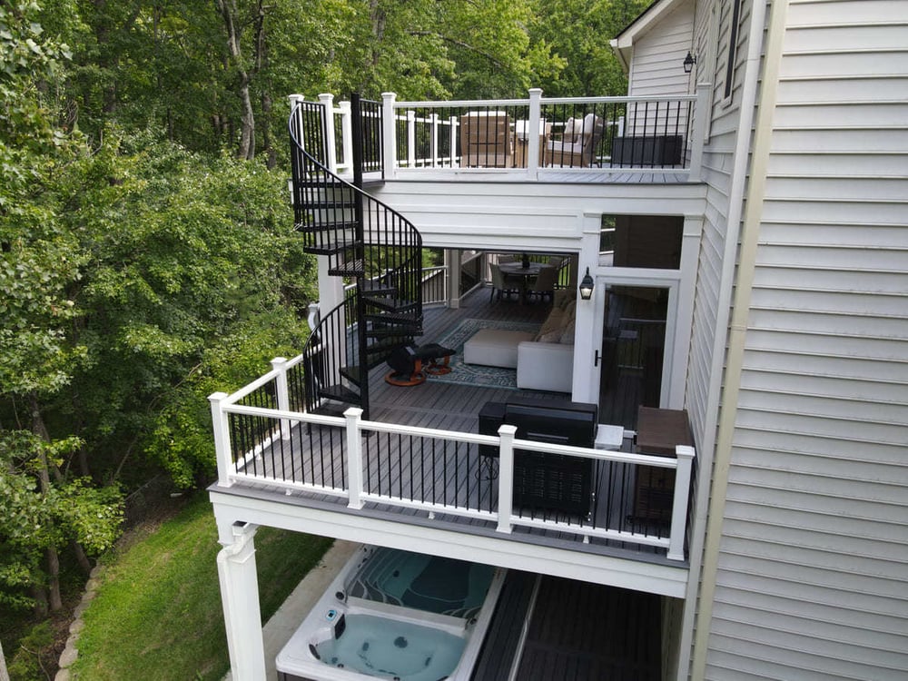 Custom spiral staircase on triple-level deck by Deckscapes of Virginia-1