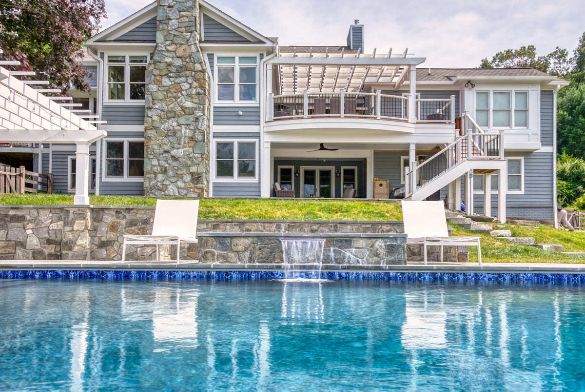 Custom stone waterfall feature on Northern Virginia gunite pool