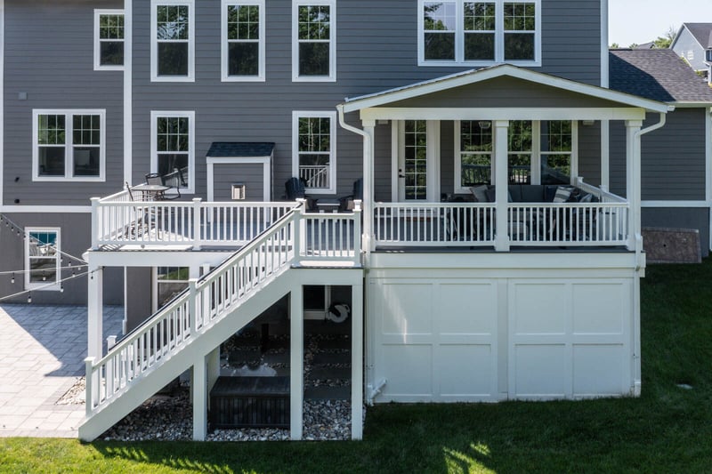 Custom white deck with porch in Northern Virginia backyard