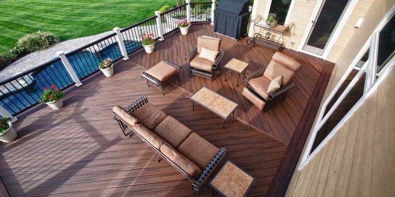 Custom Outdoor Deck With Furniture by Deckscapes of Virginia