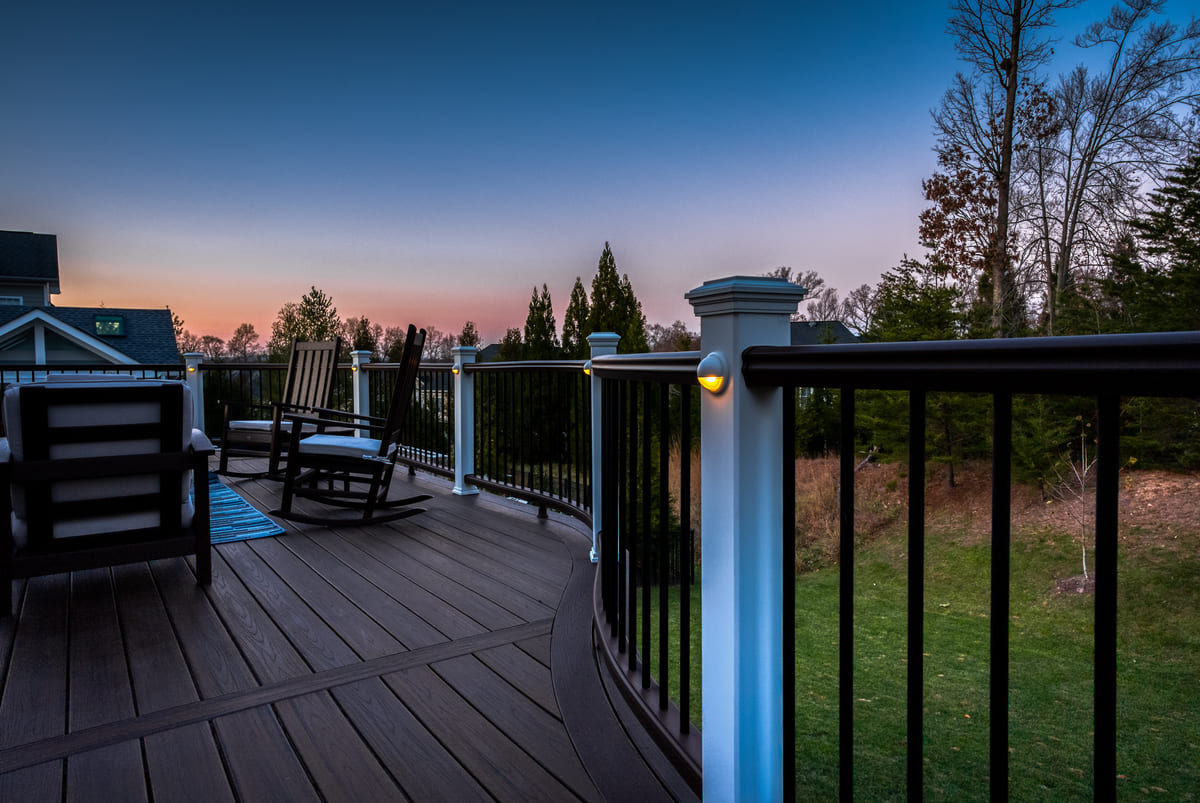 Deck rail lights at twilight in Northern Virginia by Deckscapes of VA