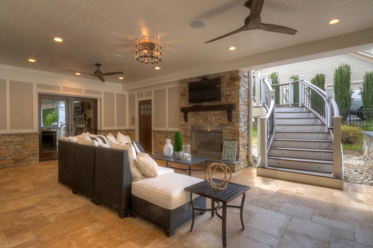 Under deck rain system and fireplace with stairs