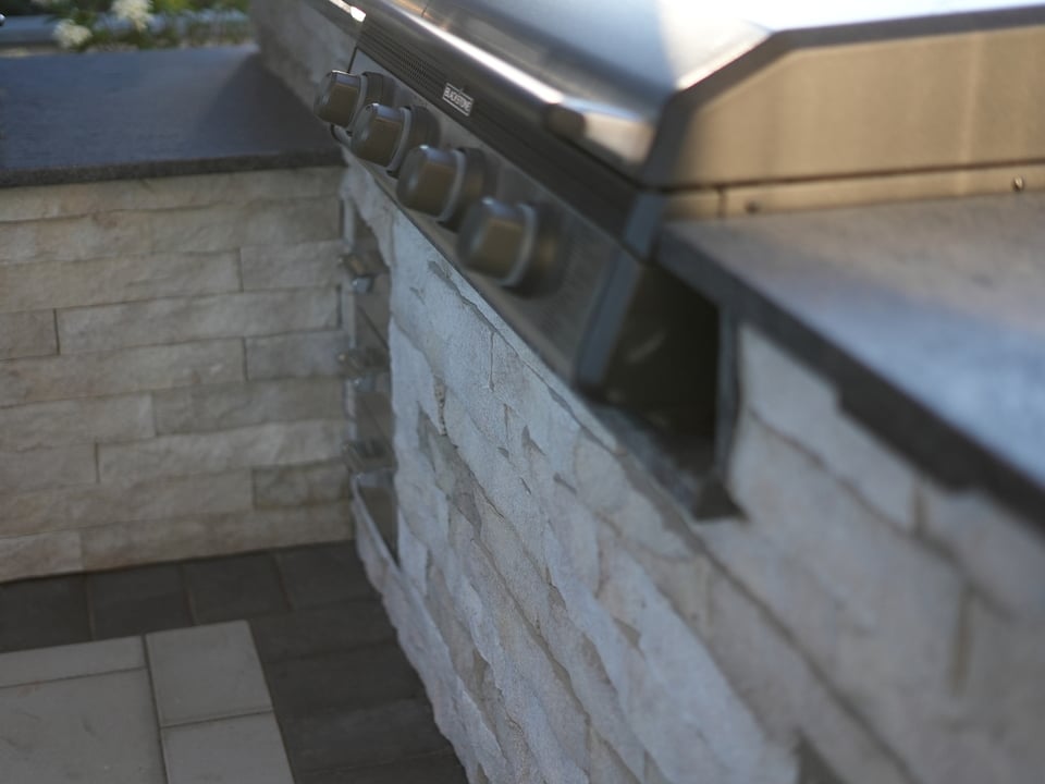 close up of grill in an outdoor kitchen in Virginia by Deckscapes