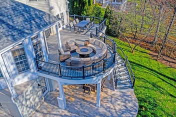 Drone view of raised deck with curved design by Deckscapes of VA