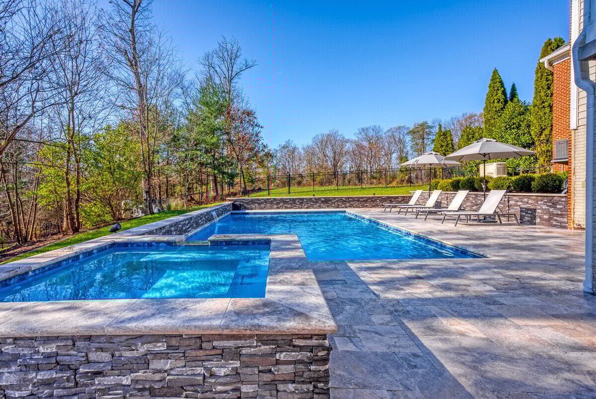 Hot tub and gunite pool in Northern Virginia backyard