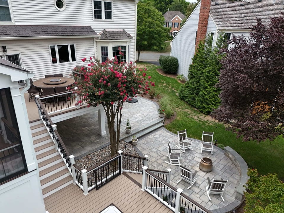 Drone view of multi-level deck and patio by Deckscapes of VA