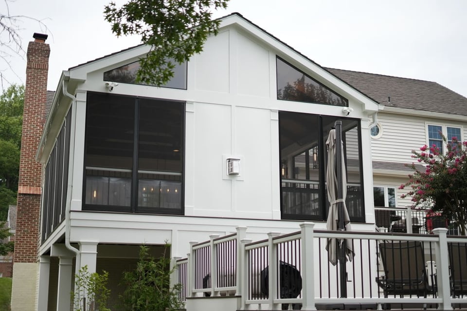 Exterior of screened-in porch with cathedral ceiling by Deckscapes of VA