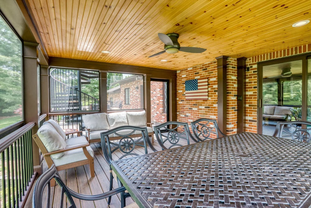 Screened porch with ceiling fan by Deckscapes of VA