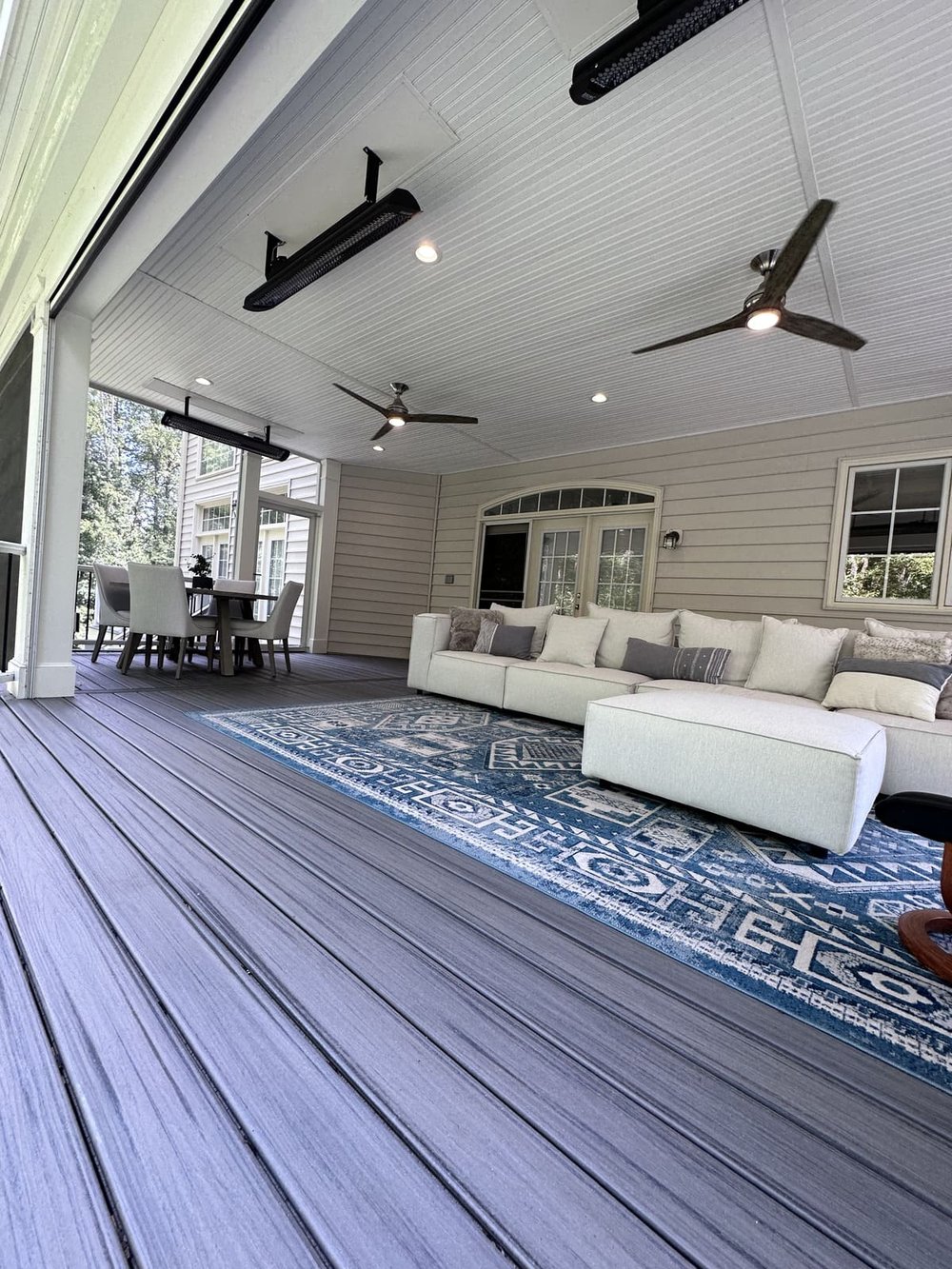 Retractable screen and waterproof decking by Deckscapes of Virginia