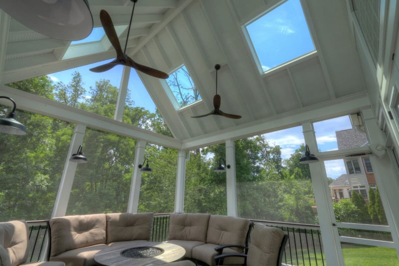 Custom screened in porch with skylights in vaulted ceiling