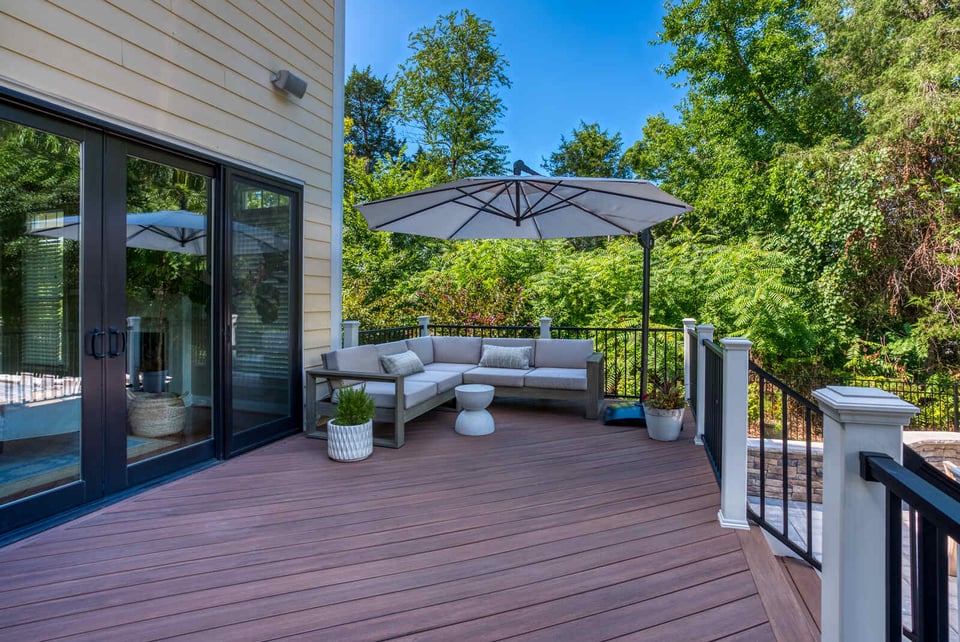 Deck with patio furniture and umbrella