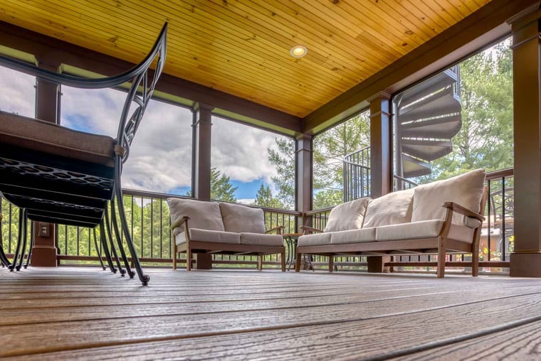 Details of screened-in porch flooring with furniture