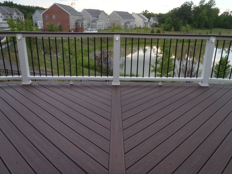 Herringbone deck pattern with white posts