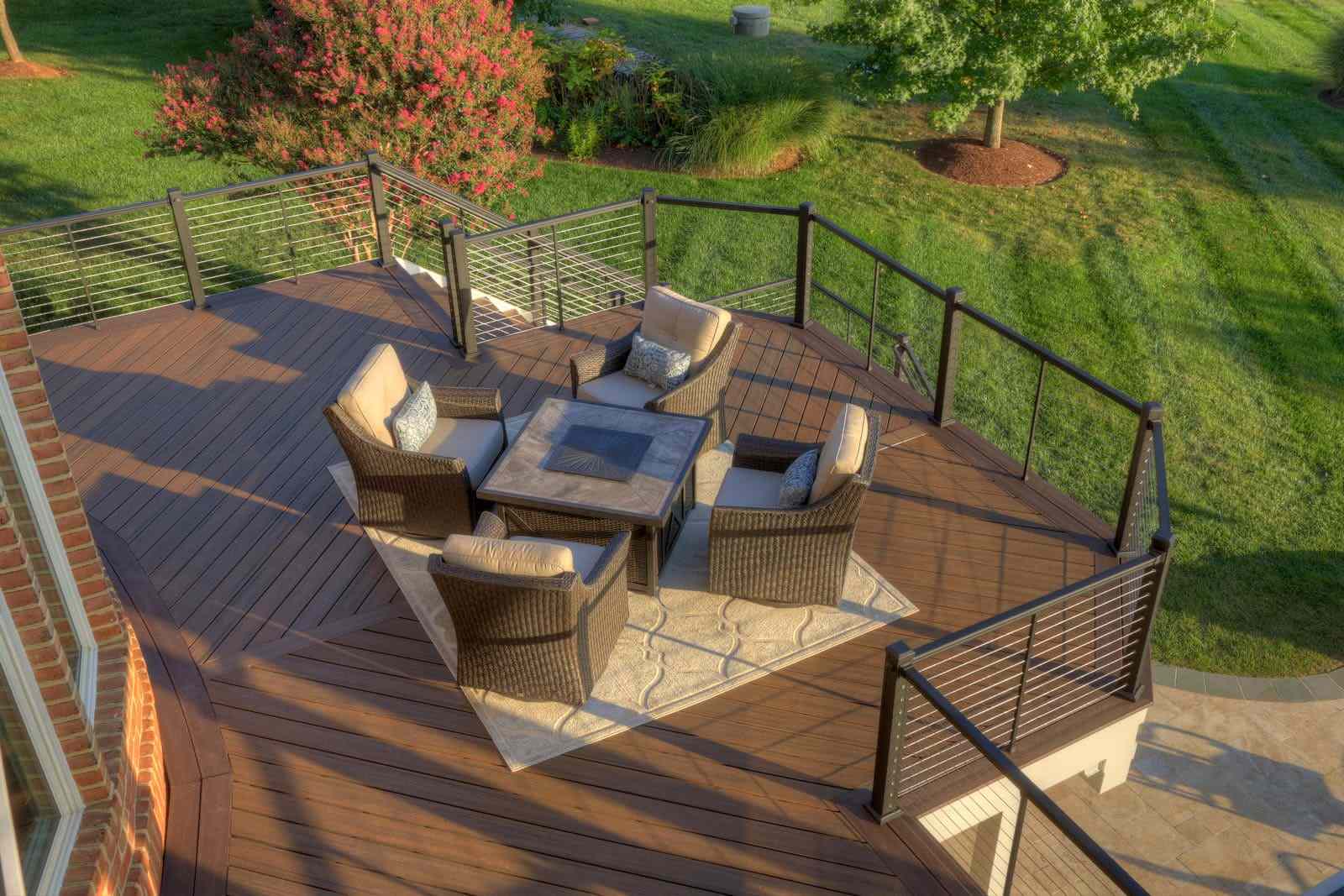 Second-story luxury deck build with outdoor furniture