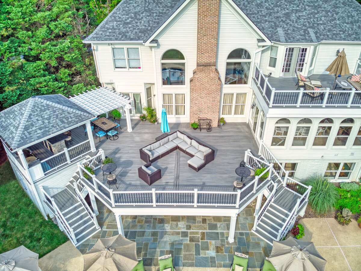 aerial-view-of-raised-deck-and-attached-porch-with-outdoor-kitchen-1