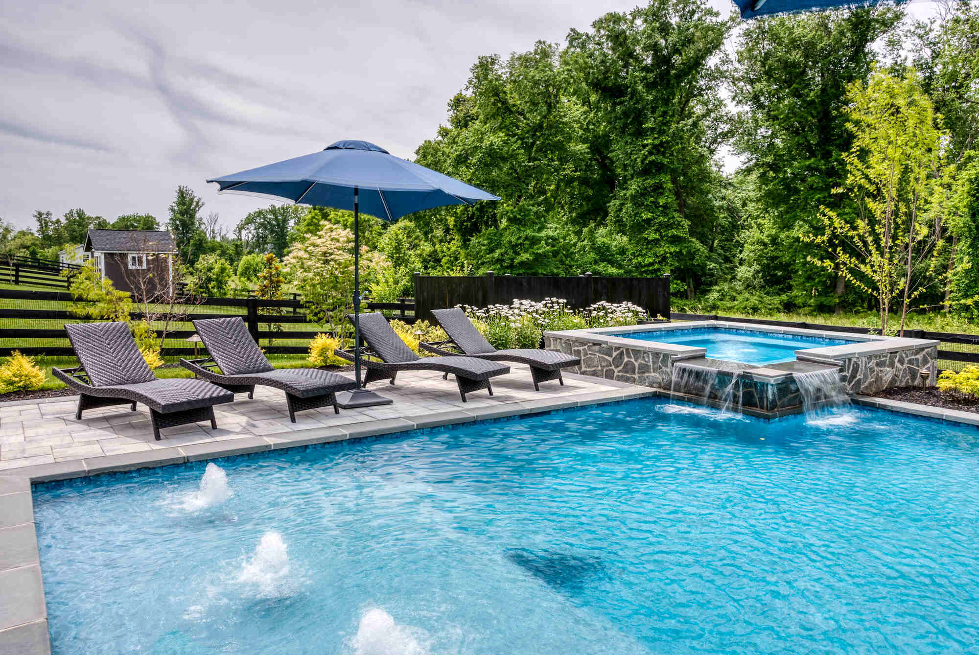 custom in ground pool with hot tub waterfall in northern virginia (1)